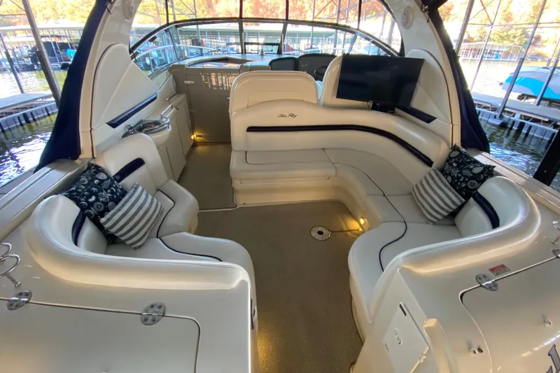 Slide: The Image of Luxurious interior of 2006 Sea Ray 38 Sundancer yacht with plush seating and elegant design. - 7