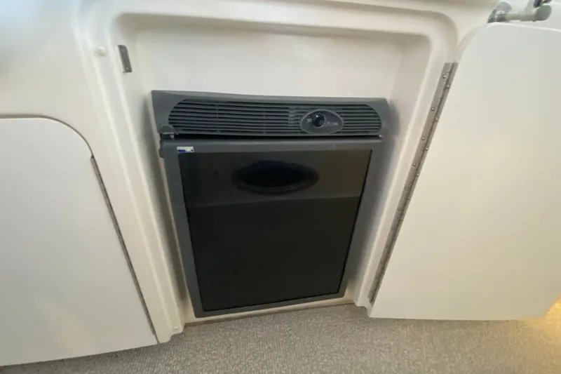 Slide: The Image of Compact refrigerator in 2006 Sea Ray 38 Sundancer yacht interior. - 12