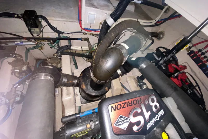 Slide: The Image of Engine compartment of a 2006 Sea Ray 38 Sundancer with MerCruiser 8.1S Horizon engine. - 39