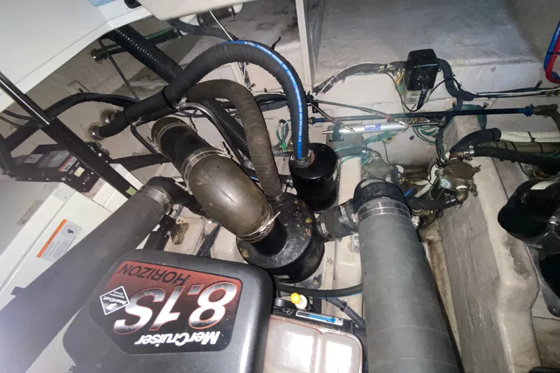Slide: The Image of Engine compartment of a 2006 Sea Ray 38 Sundancer with MerCruiser 8.1S Horizon engine. - 48