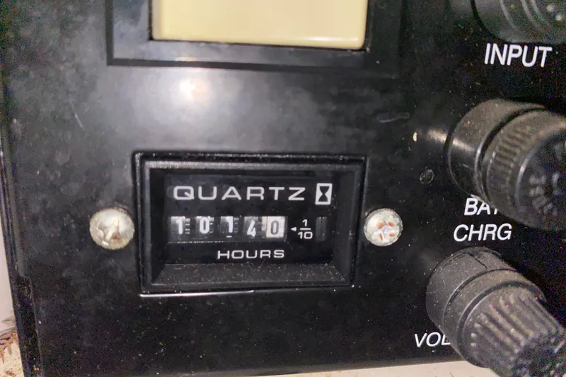 Slide: The Image of Hour meter showing 1014 hours on 2006 Sea Ray 38 Sundancer boat. - 47