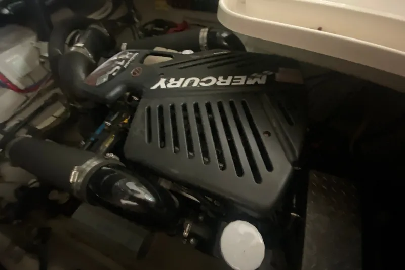 Slide: The Image of Engine compartment of a 2006 Sea Ray 38 Sundancer with a Mercury engine. - 45
