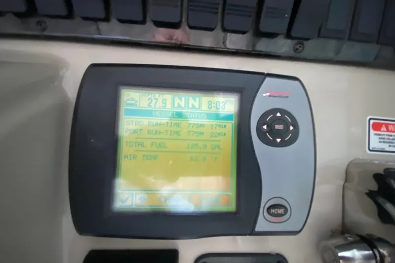 Slide: The Image of Display screen on 2006 Sea Ray 38 Sundancer showing vessel status and navigation data. - 19
