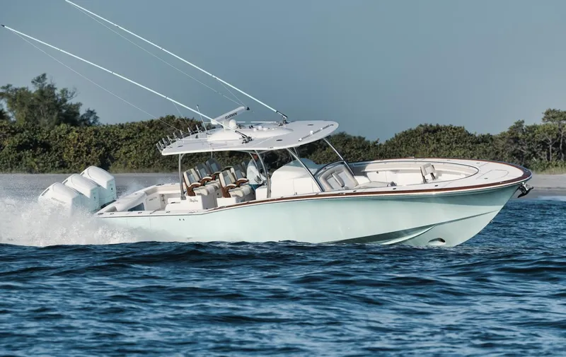 Slide: The Image of 2025 Mag Bay 43 CC boat cruising on the water. - 4