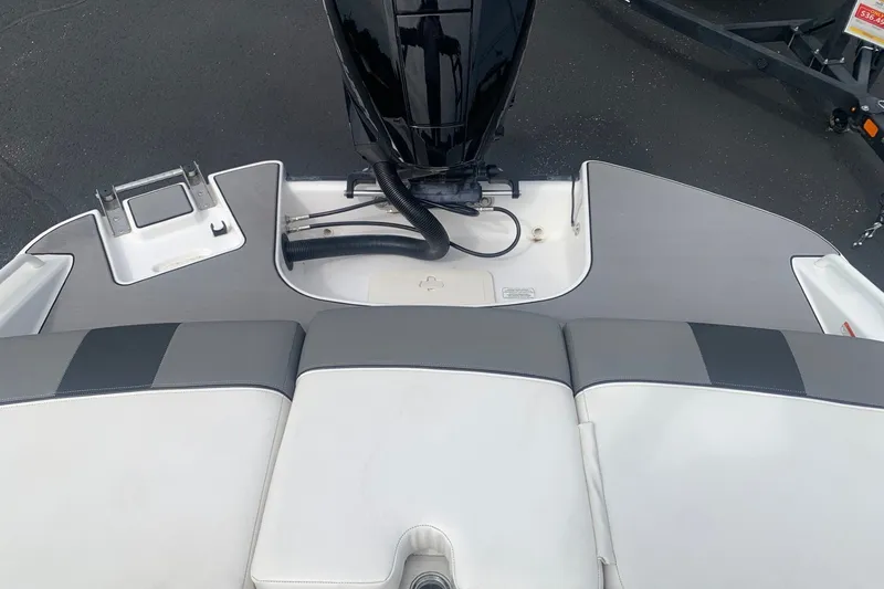 Slide: The Image of 2025 Tahoe T21 boat stern with seating and motor, showcasing sleek design and functionality. - 8