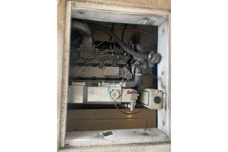 Slide: The Image of Engine compartment of a 1995 Bayliner 4788 Pilot House Motoryacht. - 47