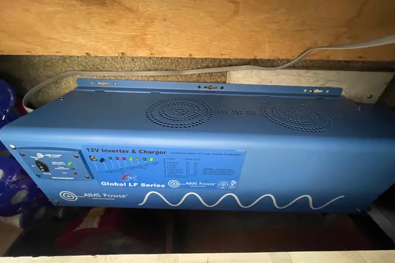 Slide: The Image of AIMS Power 12V inverter and charger in a 1995 Bayliner 4788 Pilot House Motoryacht. - 45