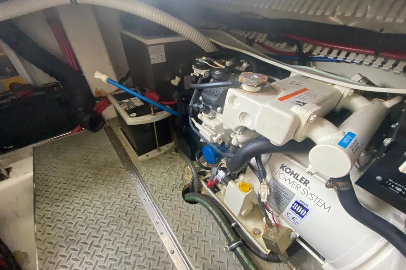 Slide: The Image of Engine room of a 2001 Formula 370 Super Sport with Kohler power system. - 42