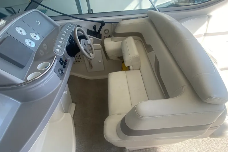 Slide: The Image of Cockpit of 2001 Formula 370 Super Sport boat with steering wheel and gauges. - 18