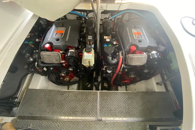 Slide: The Image of Engine compartment of a 2001 Formula 370 Super Sport boat with Volvo Penta engines. - 39