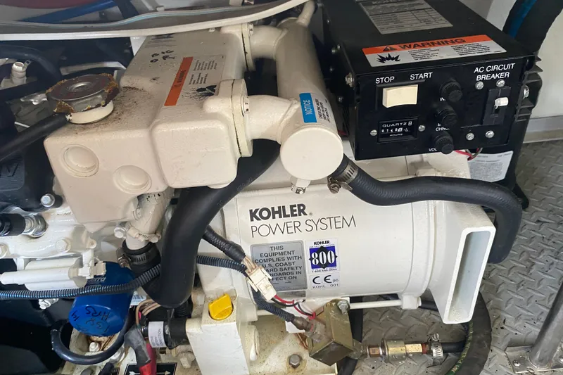 Slide: The Image of Kohler power system in a 2001 Formula 370 Super Sport boat engine compartment. - 40