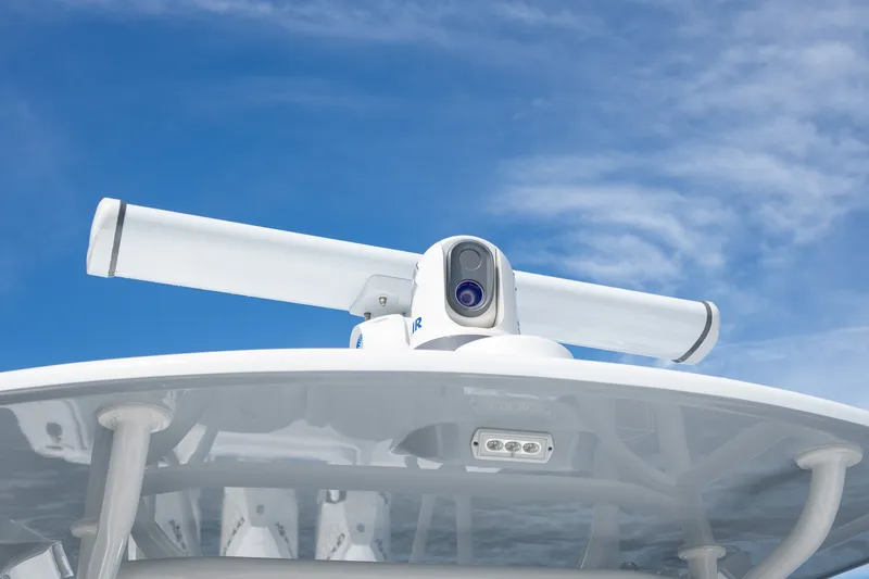 Slide: The Image of Radar system on 2021 Yellowfin 36 Offshore boat against blue sky. - 26