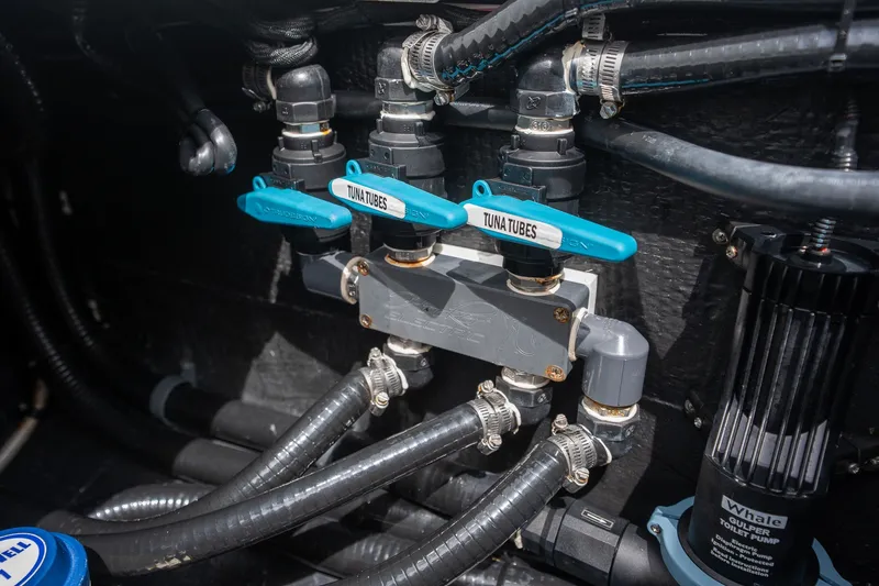 Slide: The Image of Plumbing system of 2021 Yellowfin 36 Offshore boat with tuna tubes and pump. - 37