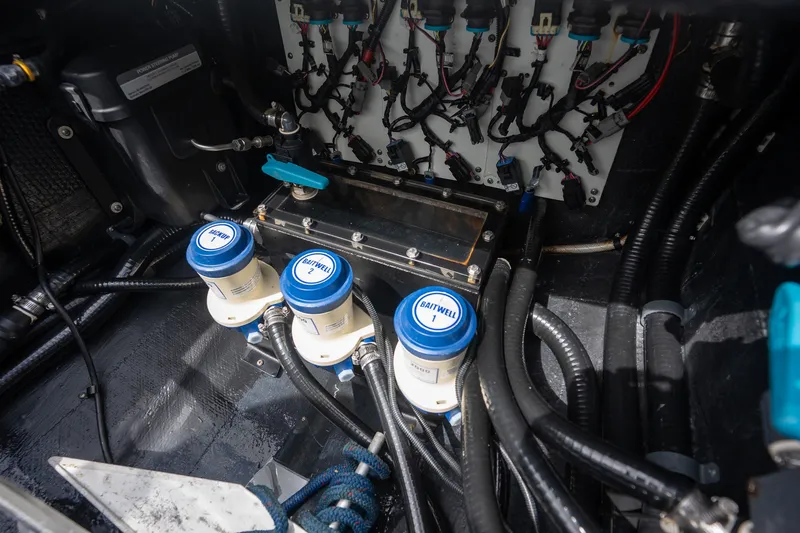 Slide: The Image of Engine compartment of 2021 Yellowfin 36 Offshore boat with wiring and components. - 35