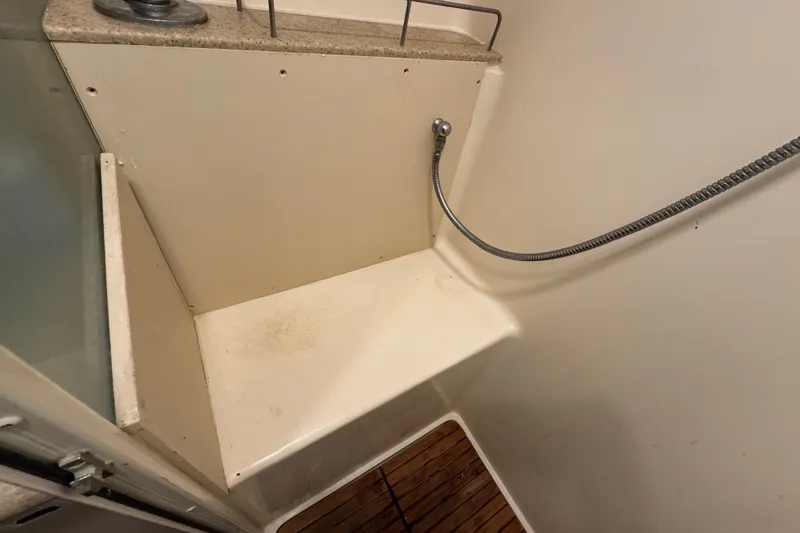 Slide: The Image of Compact shower area in a 2009 Hunter 49 yacht with handheld showerhead. - 54