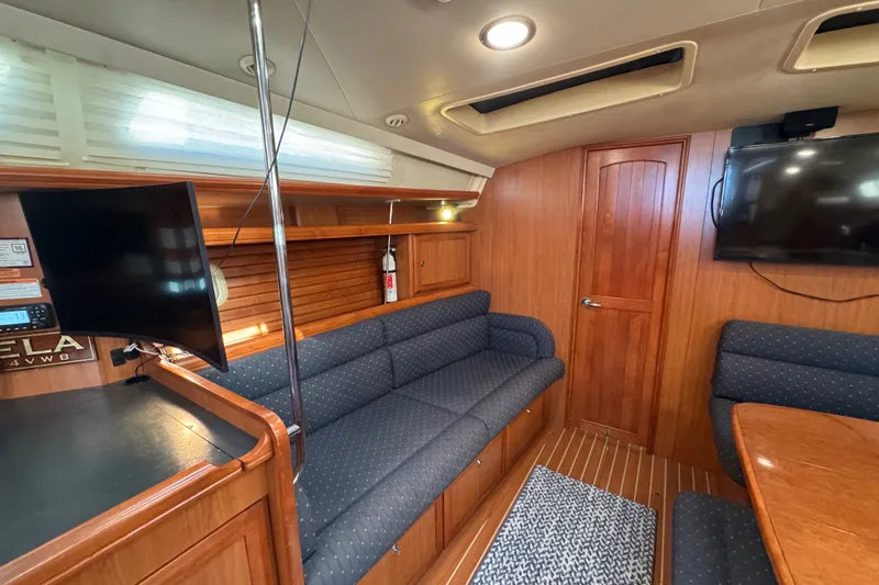 Slide: The Image of Interior of 2009 Hunter 49 yacht with cozy seating and modern amenities. - 26