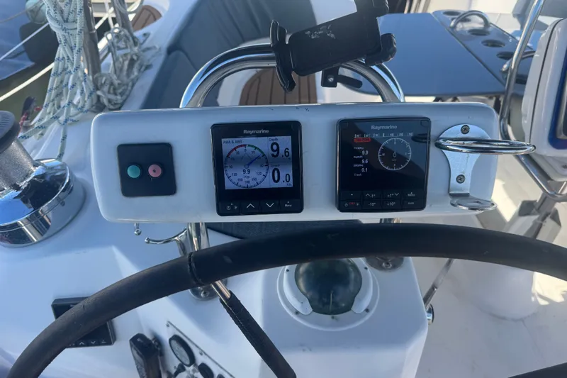 Slide: The Image of Cockpit of 2009 Hunter 49 sailboat with Raymarine navigation instruments. - 115