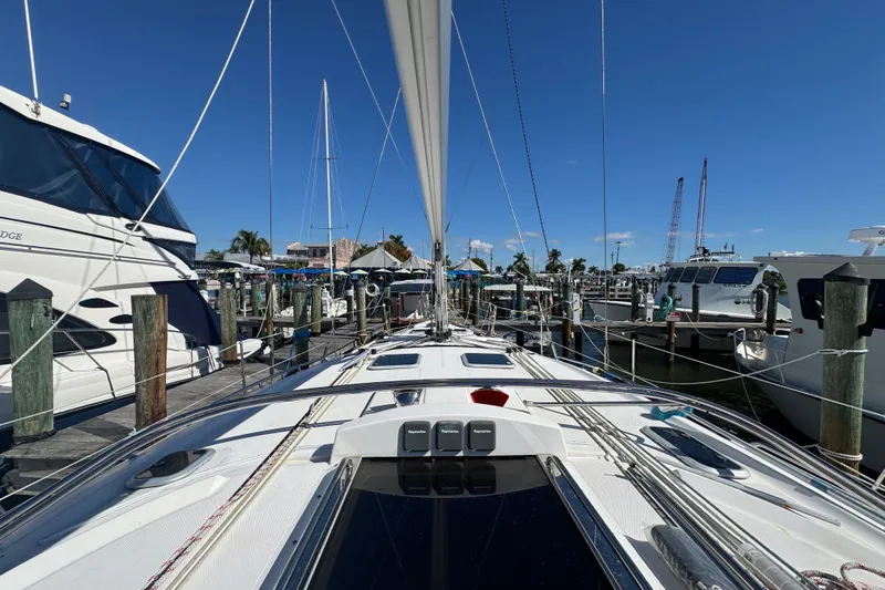 Slide: The Image of Sailboat docked at marina, Hunter 49 model, 2009, under clear blue sky. - 87