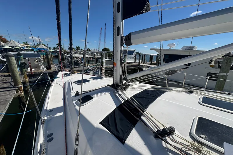 Slide: The Image of Sailboat docked at marina, Hunter 49 model, 2009, with clear blue sky. - 92
