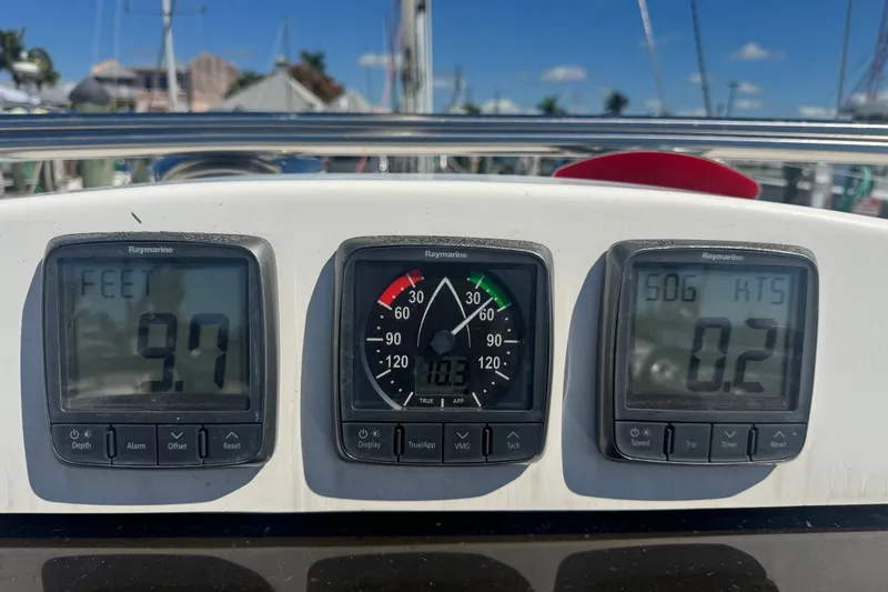 Slide: The Image of Boat dashboard with Raymarine instruments on a 2009 Hunter 49 sailboat. - 118