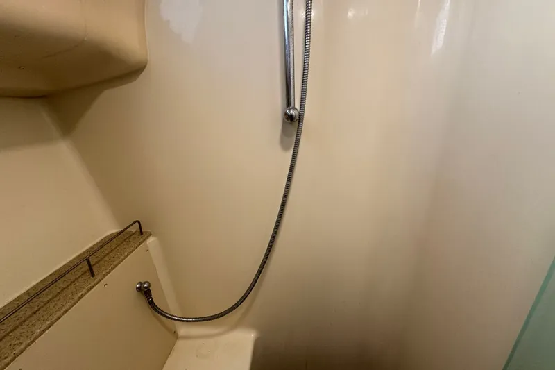 Slide: The Image of Shower area in a 2009 Hunter 49 yacht with handheld showerhead. - 51