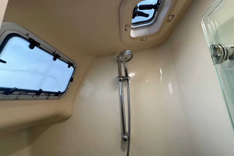 Slide: The Image of Interior shower of 2009 Hunter 49 yacht with windows and showerhead. - 50