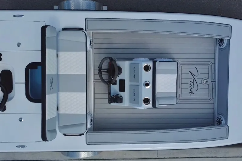 Slide: The Image of Overhead view of 2025 Vtech 18 boat interior with seating and controls. - 24