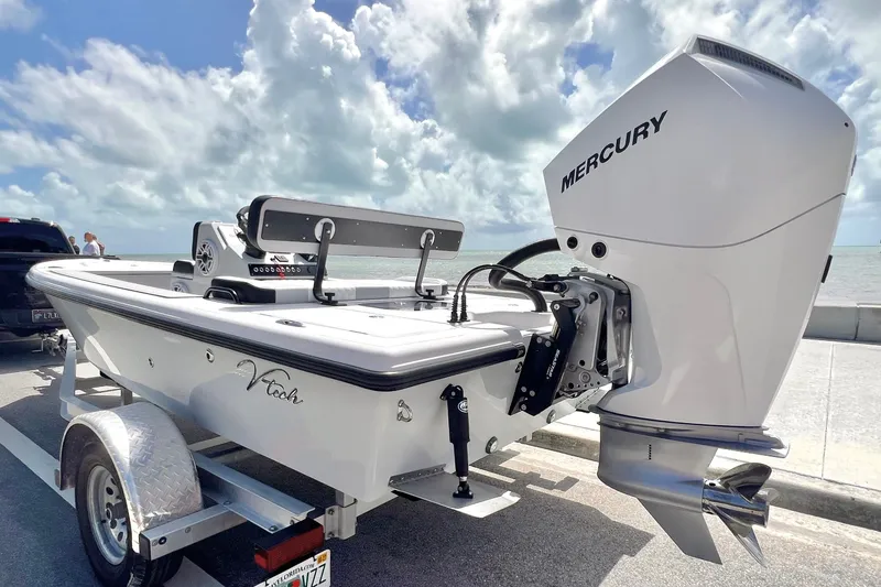 Slide: The Image of Custom Vtech 18 Flats boat with Mercury engine on trailer, 2025 model. - 14
