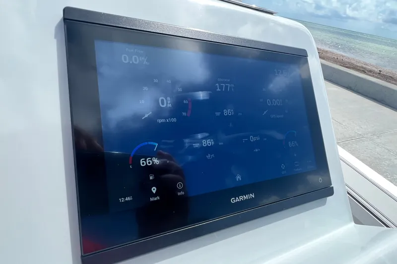 Slide: The Image of Garmin marine display showing navigation data on a Vtech 18, 2025 model boat. - 55
