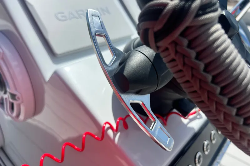 Slide: The Image of Close-up of a Vtech 18 device, featuring a coiled cable and metallic components, 2025 model. - 73