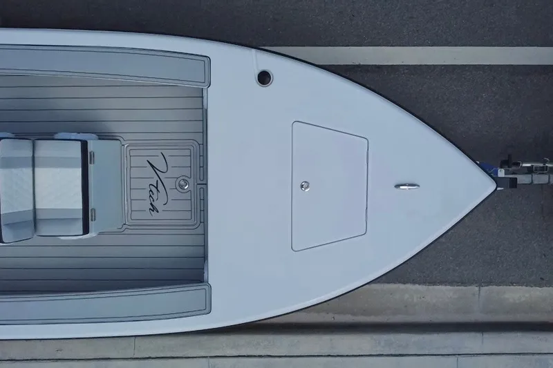 Slide: The Image of Top view of a 2025 Vtech 18 boat on a trailer, showcasing sleek design. - 25