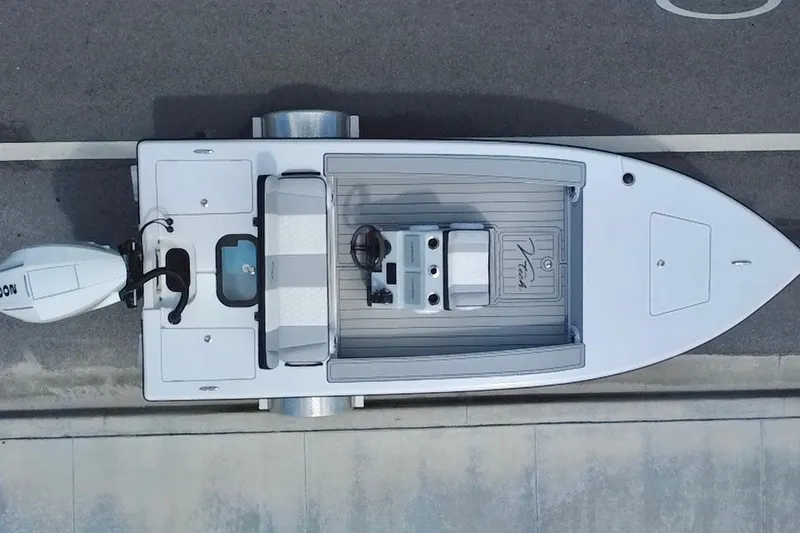 Slide: The Image of Overhead view of a 2025 Vtech 18 boat on a trailer, showcasing sleek design. - 22