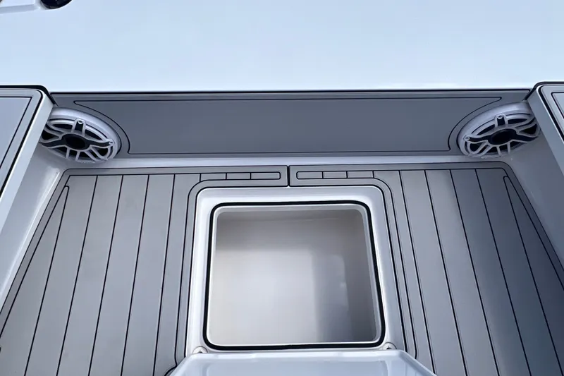 Slide: The Image of Modern Vtech 18 boat interior with speakers and storage, 2025 model. - 64