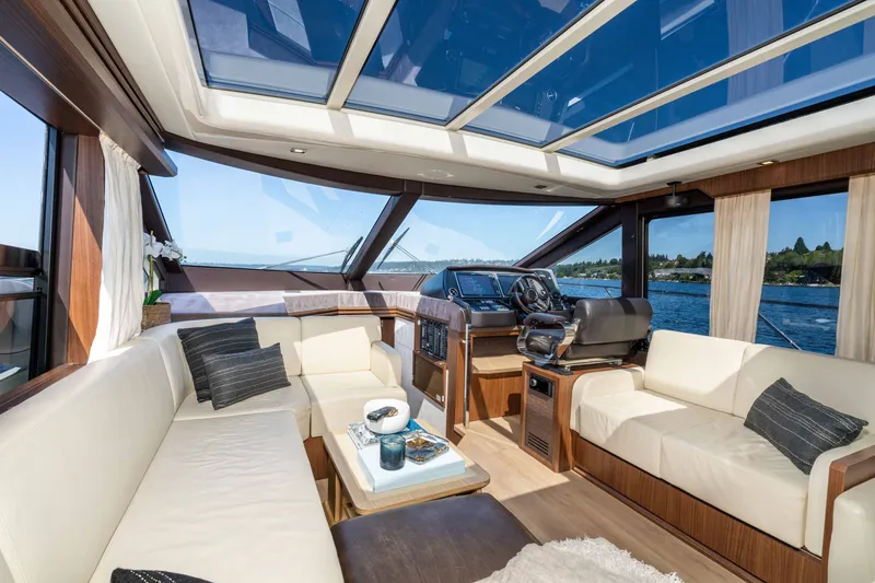 Slide: The Image of Luxurious interior of 2015 Absolute 56 STC yacht with panoramic windows and elegant seating. - 22