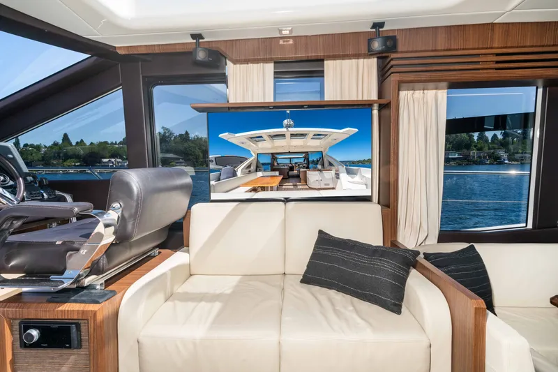 Slide: The Image of Luxurious interior of 2015 Absolute 56 STC yacht with leather seating and scenic views. - 32