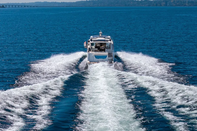 Slide: The Image of Luxury yacht Absolute 56 STC cruising on open blue water, 2015 model. - 15