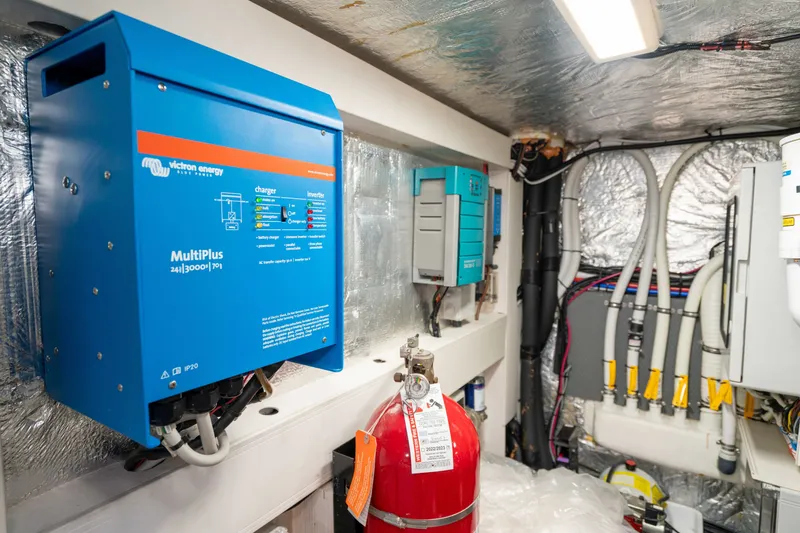 Slide: The Image of Electrical system inside a 2015 Absolute 56 STC yacht, featuring Victron Energy MultiPlus inverter. - 70