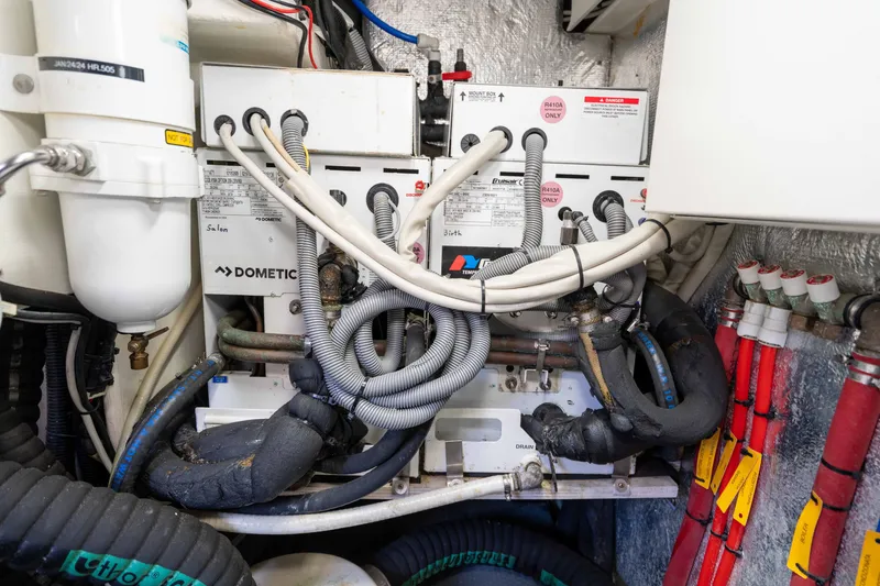 Slide: The Image of Engine room of a 2015 Absolute 56 STC yacht with Dometic equipment and wiring. - 75