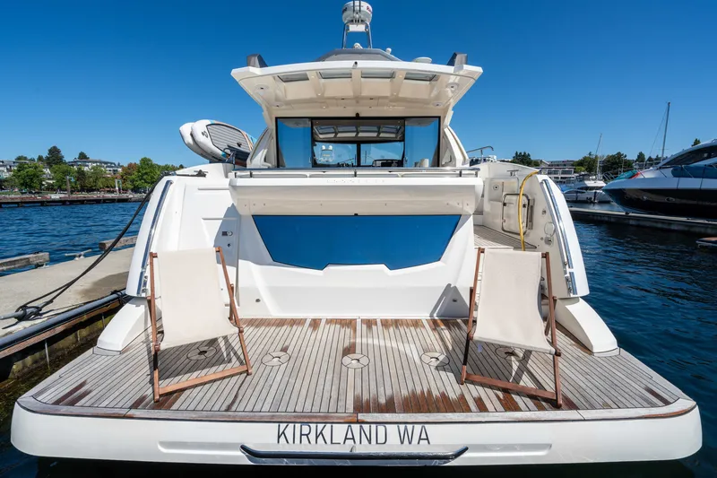 Slide: The Image of Luxury 2015 Absolute 56 STC yacht docked with deck chairs, Kirkland WA. - 17