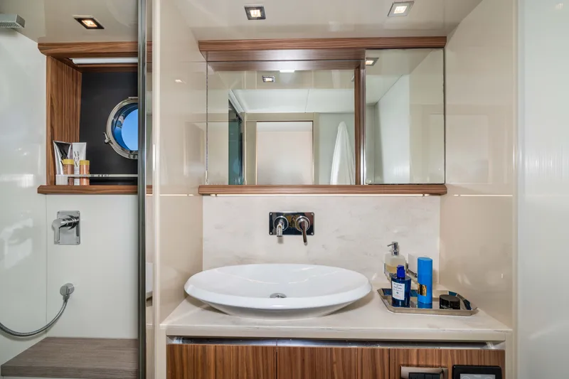 Slide: The Image of Luxurious bathroom interior of 2015 Absolute 56 STC yacht with modern fixtures and elegant design. - 41