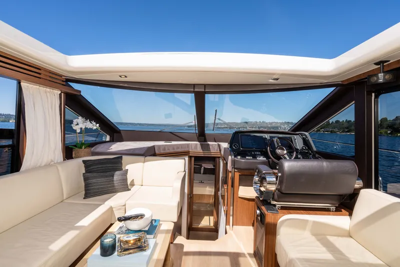 Slide: The Image of Luxurious interior of 2015 Absolute 56 STC yacht with panoramic views and elegant seating. - 31