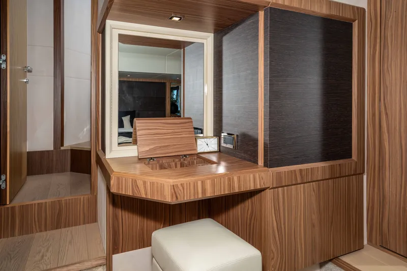 Slide: The Image of Luxurious interior of 2015 Absolute 56 STC yacht with elegant wood finish and mirror. - 40