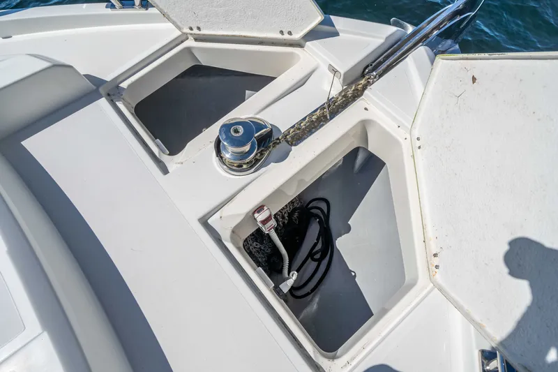 Slide: The Image of Open storage compartments on a 2015 Absolute 56 STC yacht deck. - 66