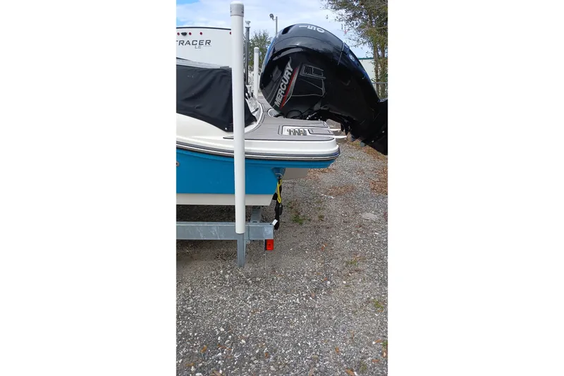 Slide: The Image of 2022 Sea Ray SPX 190 Outboard boat on trailer, featuring Mercury engine. - 8