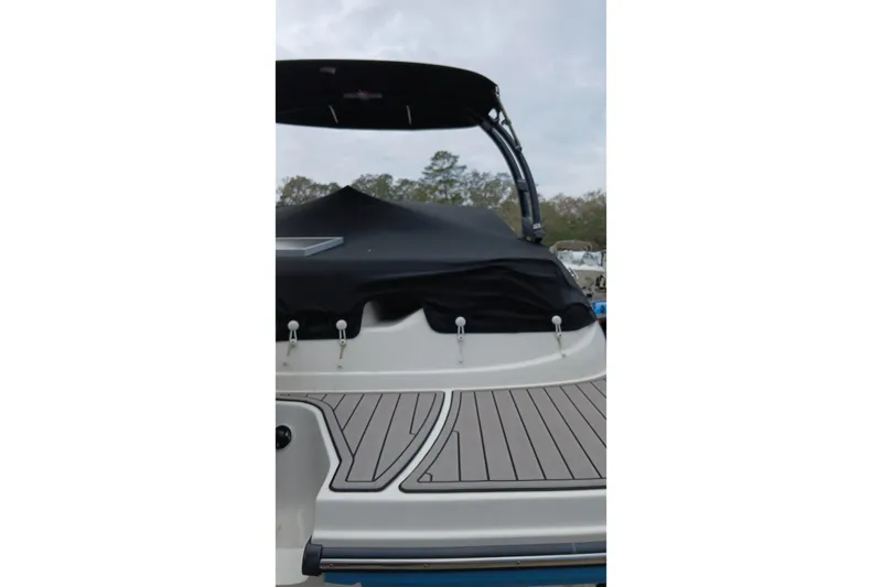 Slide: The Image of 2022 Sea Ray SPX 190 Outboard boat with covered deck and sleek design. - 11