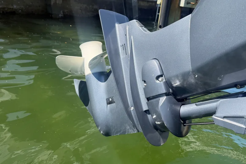 Slide: The Image of Close-up of a 2023 Bennington 20 SVL boat motor propeller in water. - 20