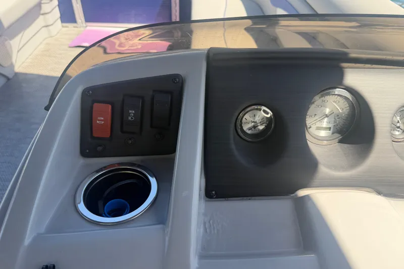 Slide: The Image of Dashboard of 2023 Bennington 20 SVL boat with switches and gauges. - 9