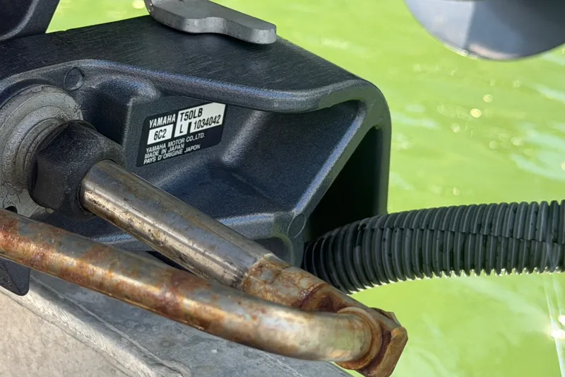 Slide: The Image of Close-up of Yamaha T50LB motor part on 2023 Bennington 20 SVL boat. - 22
