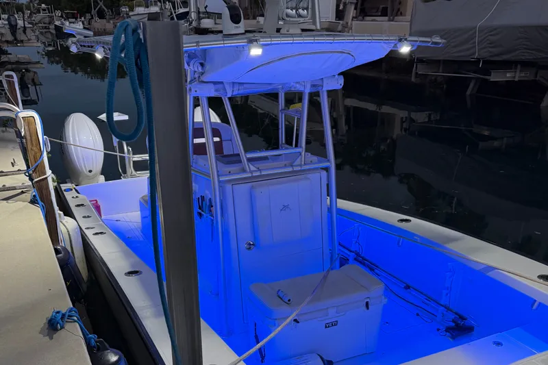 Slide: The Image of 2015 Calcutta 263 boat docked at night with blue LED lighting. - 11