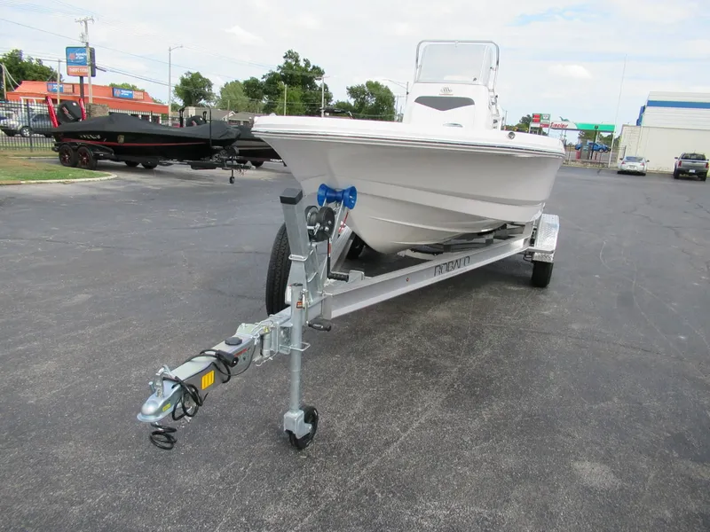 Slide: The Image of A 2027 Robalo 206 Pro boat on a trailer, parked in a lot. - 3